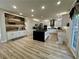 Modern kitchen with stainless steel appliances, black island and stylish backsplash at 1782 Telfair Chase Way, Lawrenceville, GA 30043