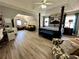 Bright main bedroom featuring sitting area, natural light, office area, and four-poster bed at 1782 Telfair Chase Way, Lawrenceville, GA 30043