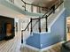 View of the staircase and foyer in a home, showcasing the architectural details and design at 1782 Telfair Chase Way, Lawrenceville, GA 30043