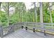 Spacious deck with a built-in bench, perfect for outdoor relaxation at 2211 Rocky Mill Dr, Lawrenceville, GA 30044