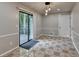 Eat-in dining area featuring sliding door access to the outdoor deck and stylish lighting at 2211 Rocky Mill Dr, Lawrenceville, GA 30044