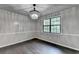 Dining room showcasing the lovely floors, decorative chandelier, and a large window with natural light at 2211 Rocky Mill Dr, Lawrenceville, GA 30044