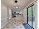 Eat-in dining area flows into the kitchen, featuring access to the outdoor deck at 2211 Rocky Mill Dr, Lawrenceville, GA 30044