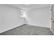 Neutral bedroom featuring soft gray carpet and ample natural light at 30 Dewey Se Ln, Marietta, GA 30060