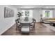 Elegant dining room area featuring modern lighting and a seamless transition to the living spaces at 30 Dewey Se Ln, Marietta, GA 30060