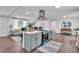 Stylish kitchen island with oven and cooktop, seamlessly connecting to the adjacent living area at 30 Dewey Se Ln, Marietta, GA 30060