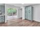 Open kitchen area featuring a sliding glass door and blue-grey cabinets at 30 Dewey Se Ln, Marietta, GA 30060