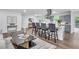 Open-concept living area with a stylish kitchen island, cozy seating, and modern decor accents at 30 Dewey Se Ln, Marietta, GA 30060