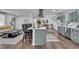 Spacious living area showcasing an open concept design with a large kitchen island and ample seating at 30 Dewey Se Ln, Marietta, GA 30060