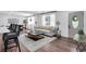Bright and inviting living room featuring a stylish sofa, modern coffee table, and plenty of natural light at 30 Dewey Se Ln, Marietta, GA 30060