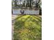 Charming single-story home with a well-maintained front yard and updated exterior at 735 Brookwood Dr, Forest Park, GA 30297