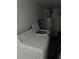 Practical laundry room equipped with modern washing machine and storage at 735 Brookwood Dr, Forest Park, GA 30297