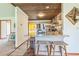 Kitchen with granite counters and wood plank ceiling with eat-in breakfast bar at 9959 Point View Dr, Jonesboro, GA 30238