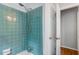 Updated bathroom features a tiled walk-in shower and white door at 385 Vineyard Nw Dr, Marietta, GA 30064