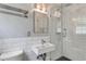 Modern bathroom with glass enclosed shower, white subway tile, square sink, and updated fixtures at 385 Vineyard Nw Dr, Marietta, GA 30064