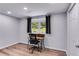Neutral bedroom with a desk looking out the window and modern vinyl flooring at 385 Vineyard Nw Dr, Marietta, GA 30064
