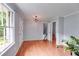 Inviting entryway with hardwood floors, neutral paint, and access to the stairs and other rooms at 385 Vineyard Nw Dr, Marietta, GA 30064