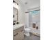Bathroom featuring modern vanity, mirror, fixtures, and shower-tub combination at 1075 Litchfield Sw Way, Marietta, GA 30060