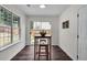 Bright breakfast nook area with a view of the fenced backyard at 1075 Litchfield Sw Way, Marietta, GA 30060