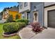 Well-maintained front yard showcasing lush landscaping and inviting entryway at 1075 Litchfield Sw Way, Marietta, GA 30060