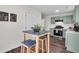 Cozy breakfast nook situated adjacent to the kitchen area at 1075 Litchfield Sw Way, Marietta, GA 30060