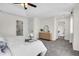 A stylish bedroom with light-colored carpet, a walk-in closet, and bathroom at 1075 Litchfield Sw Way, Marietta, GA 30060
