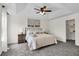 The main bedroom boasts natural light, plush carpet, and a spacious walk-in closet at 1075 Litchfield Sw Way, Marietta, GA 30060