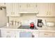 Fully equipped kitchen with stove, cabinets and laminate countertops at 205 Summer Walk Dr, Covington, GA 30016