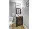 Bathroom featuring a modern vanity with dark wood and flooring at 3452 Chesterfield Ct, Snellville, GA 30039