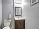 Bathroom featuring a modern vanity with dark wood and a clean, white sink at 3452 Chesterfield Ct, Snellville, GA 30039