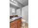 Bathroom featuring a vanity with granite countertop, white toilet and a shower with a curtain at 3452 Chesterfield Ct, Snellville, GA 30039