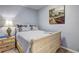 Cozy bedroom features light walls, wood furniture, and simple decor at 3452 Chesterfield Ct, Snellville, GA 30039