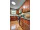 Gourmet kitchen featuring granite countertops, stainless steel appliances and custom cabinetry at 3452 Chesterfield Ct, Snellville, GA 30039