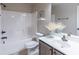 This bathroom features a shower-tub combo, framed mirror, and complementary decor at 965 Mulberry Bay Dr, Dacula, GA 30019