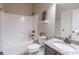 Bathroom featuring granite countertop, toilet, tub, and shower at 965 Mulberry Bay Dr, Dacula, GA 30019