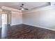Bedroom with hardwood floors, ceiling fan and tray ceiling at 965 Mulberry Bay Dr, Dacula, GA 30019