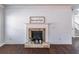 Close up of the decorative stone fireplace with a white mantel and shiplap wall at 965 Mulberry Bay Dr, Dacula, GA 30019