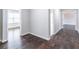 Hallway with hardwood floors leading to rooms at 965 Mulberry Bay Dr, Dacula, GA 30019