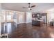Open concept layout features hardwood floors, a fireplace and a modern kitchen island at 965 Mulberry Bay Dr, Dacula, GA 30019