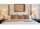 Cozy bedroom featuring elegant decor, warm lighting, and a comfortable bed with pillows at 1242 Morton Trce Se Trce, Atlanta, GA 30316