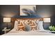 Cozy bedroom with a modern headboard, decorative pillows, and ambient lighting at 1242 Morton Trce Se Trce, Atlanta, GA 30316
