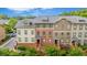 Attractive townhome complex with brick accents, multiple stories, and lush landscaping for great curb appeal at 1242 Morton Trce Se Trce, Atlanta, GA 30316