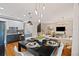 Living area with open floor plan, dining, kitchen, and modern finishes throughout at 1242 Morton Trce Se Trce, Atlanta, GA 30316
