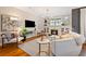 Comfortable living room featuring contemporary décor, sleek furniture, hardwood floors, and ample natural light at 1242 Morton Trce Se Trce, Atlanta, GA 30316