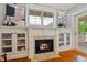 Close up view of a stylish fireplace with built-in shelving, perfect for showcasing your personal style at 1242 Morton Trce Se Trce, Atlanta, GA 30316
