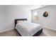 Cozy bedroom features neutral carpet, light gray walls, and a comfy bed at 1341 Midnight Ride Ct, Hampton, GA 30228