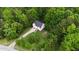 Aerial view of the home and lush green surrounding landscaping at 59 Abbotsford Dr, Villa Rica, GA 30180