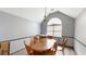 Cozy dining room with wood table, chandelier, and neutral paint at 59 Abbotsford Dr, Villa Rica, GA 30180