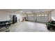 Spacious three-car garage with two doors, plenty of storage space and access to the home at 59 Abbotsford Dr, Villa Rica, GA 30180