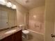 Bathroom featuring a vanity with granite countertop, toilet, and shower-tub combination at 1038 Westfield Se Trce, Smyrna, GA 30082